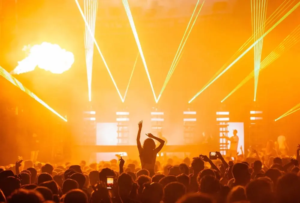 beautiful-shot-live-concert-performance-with-yellow-light-show-big-crowd-cheering (1)