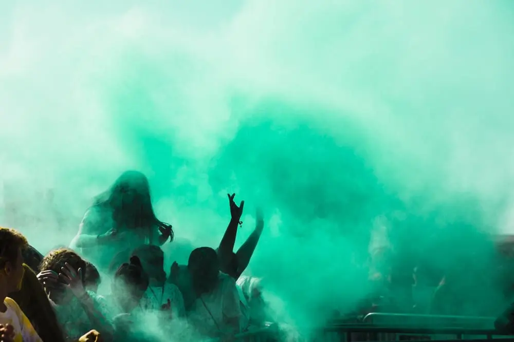 green-holi-color-powder-crowd (1)